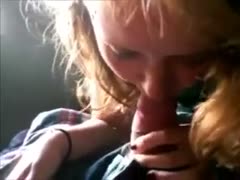 The red-haired harlot is skilled at providing amazing oral service.